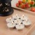 Świeczki podgrzewacze tealight 50 szt. 2h bezzapachowe białe dekoracyjne